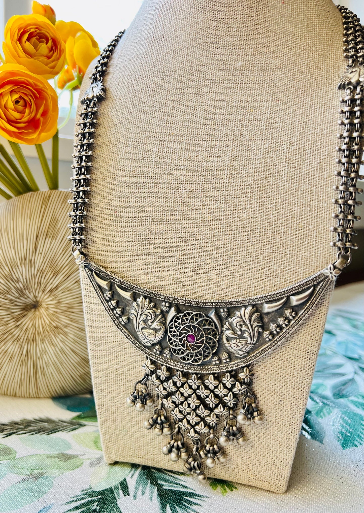 Silver long peacock motif necklace