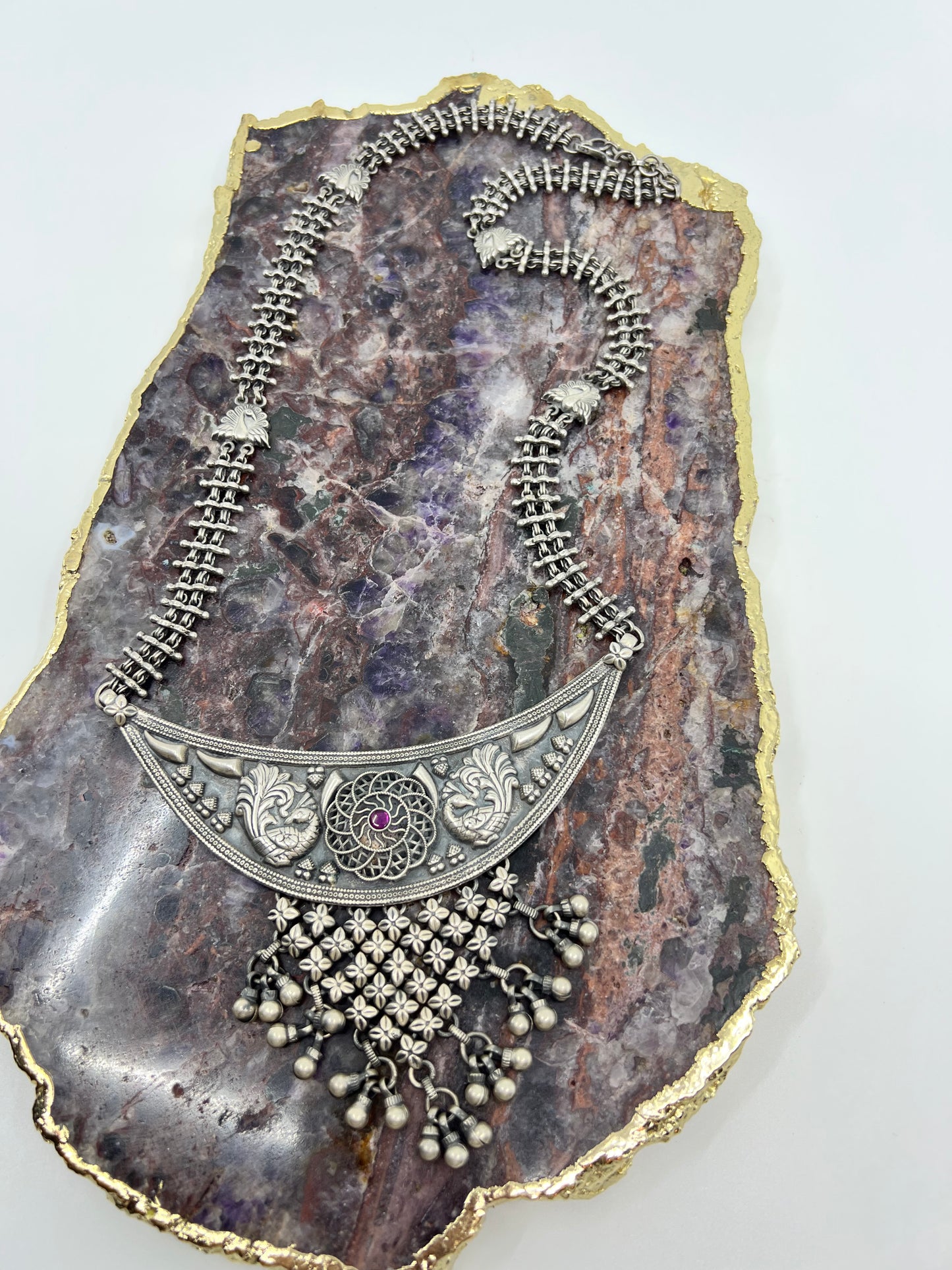 Silver long peacock motif necklace